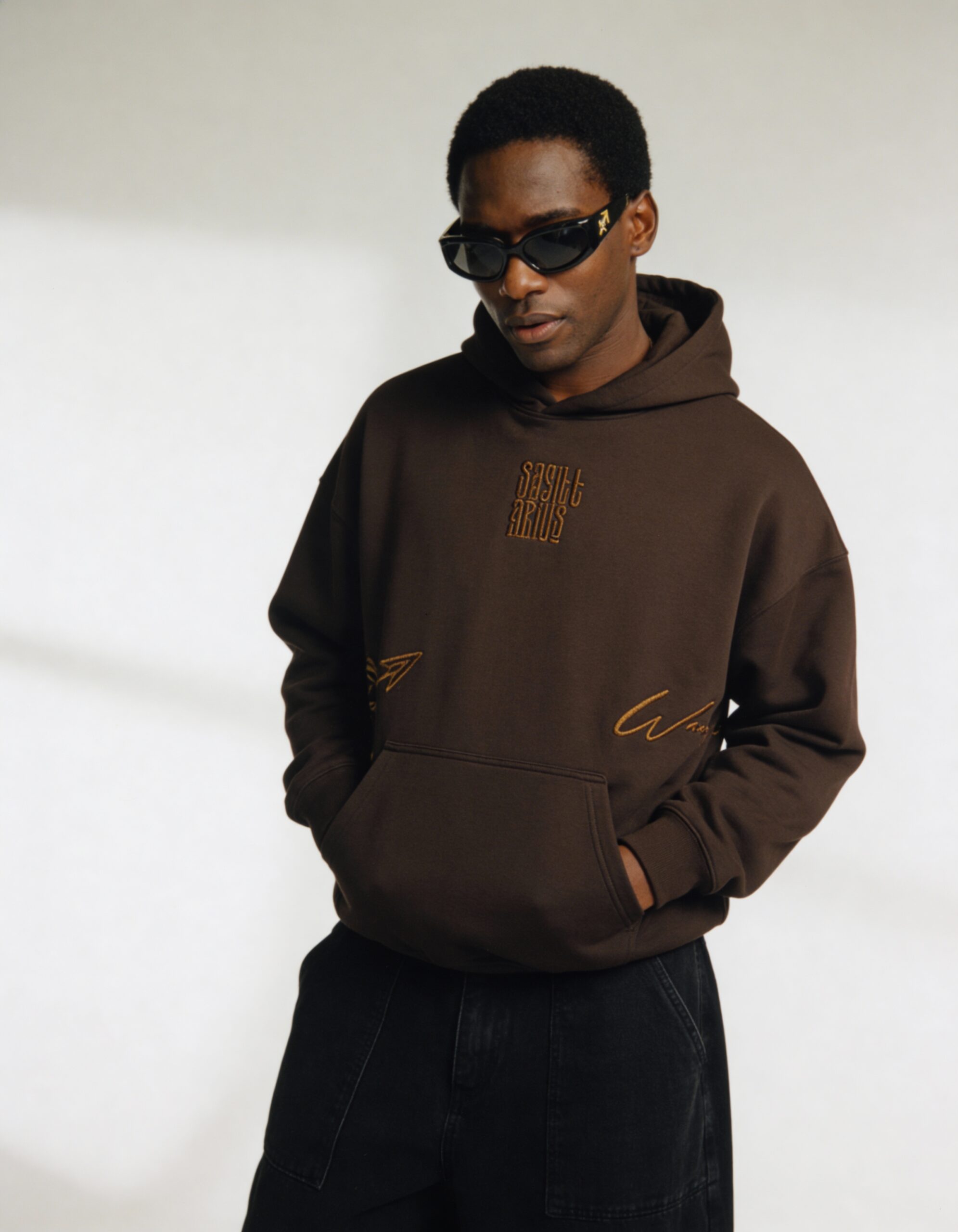 freepik__a-manin-a-gen-z-inspired-outfit-wearing-a-poly-cot__82552 Sagittarius Embroidery Hoodie For Men - Image 9