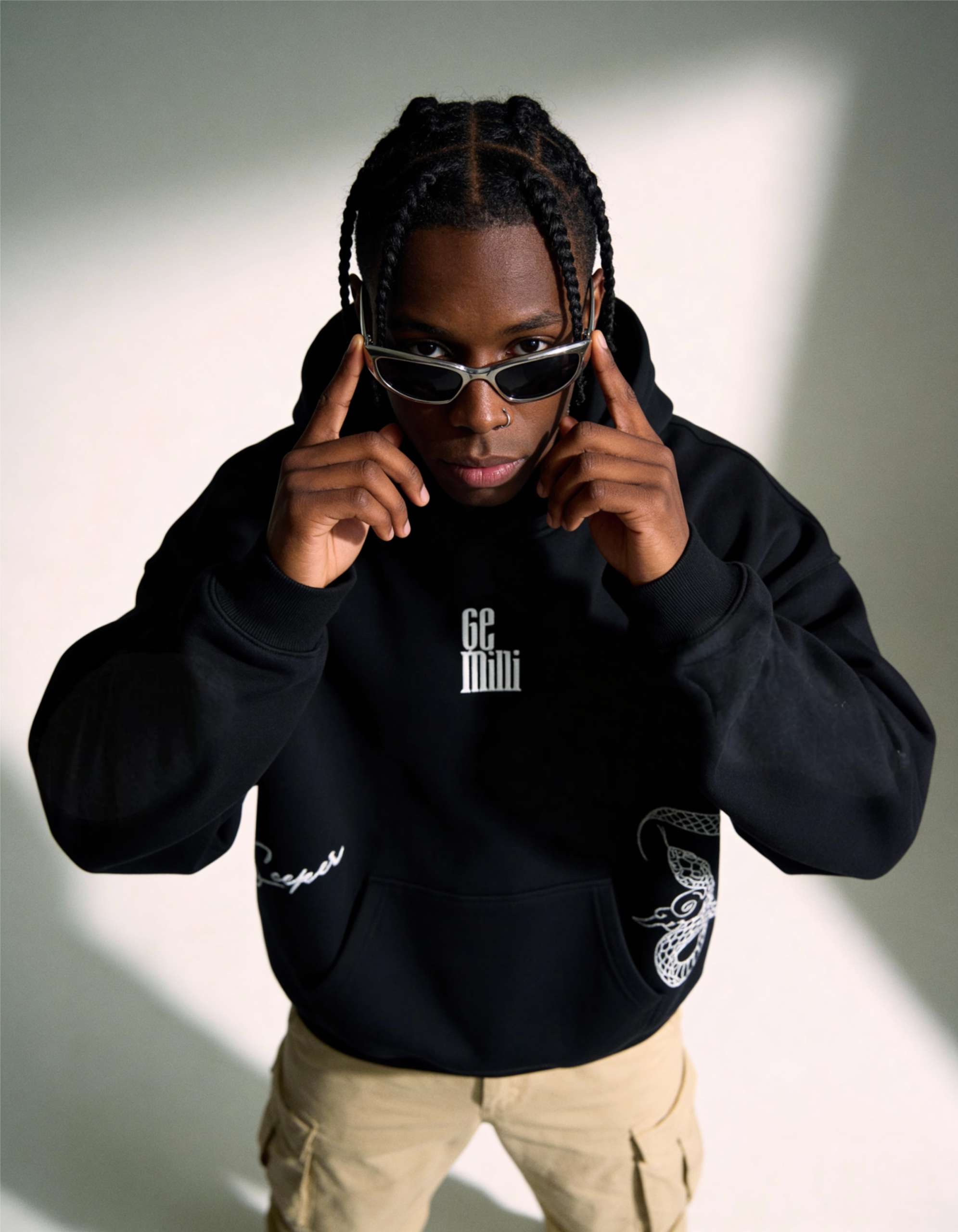 freepik__darkskinned-man-with-braided-hair-and-wearing-a-no__35588 Gemini Embroidery Hoodie For Men