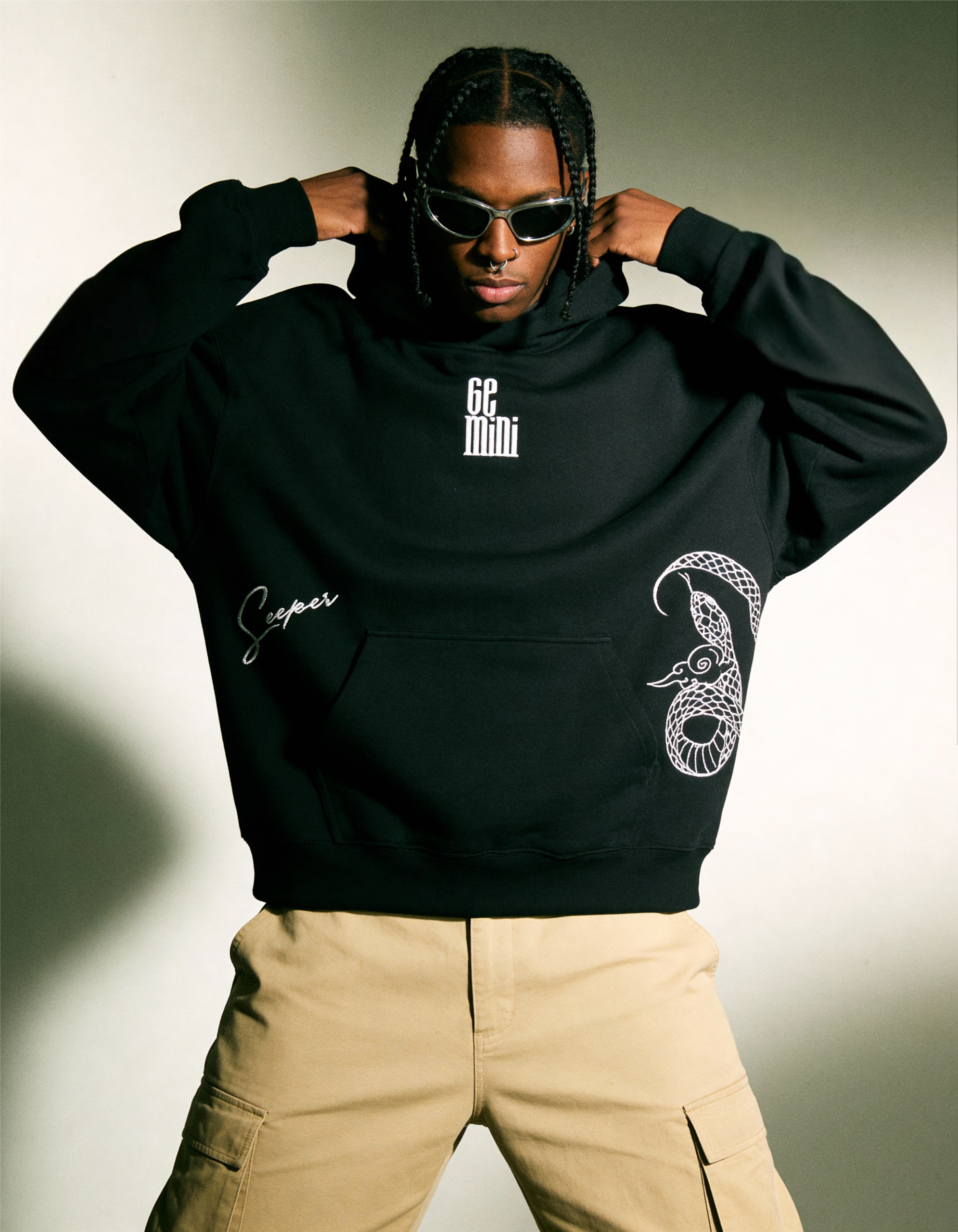 freepik__darkskinned-man-with-braided-hair-and-wearing-a-no__35589 Gemini Embroidery Hoodie For Men - Image 3