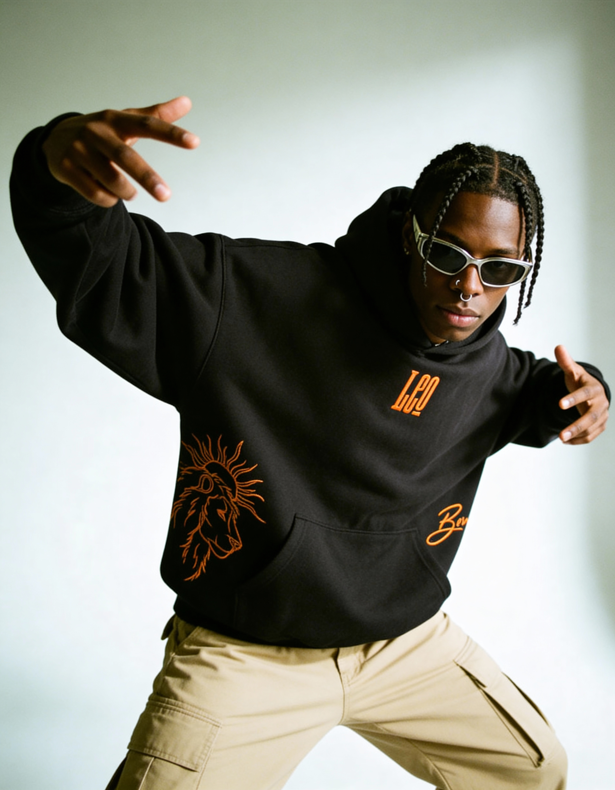 freepik__darkskinned-man-with-braided-hair-and-wearing-a-no__71304 Leo Embroidery Hoodie For Men - Image 5