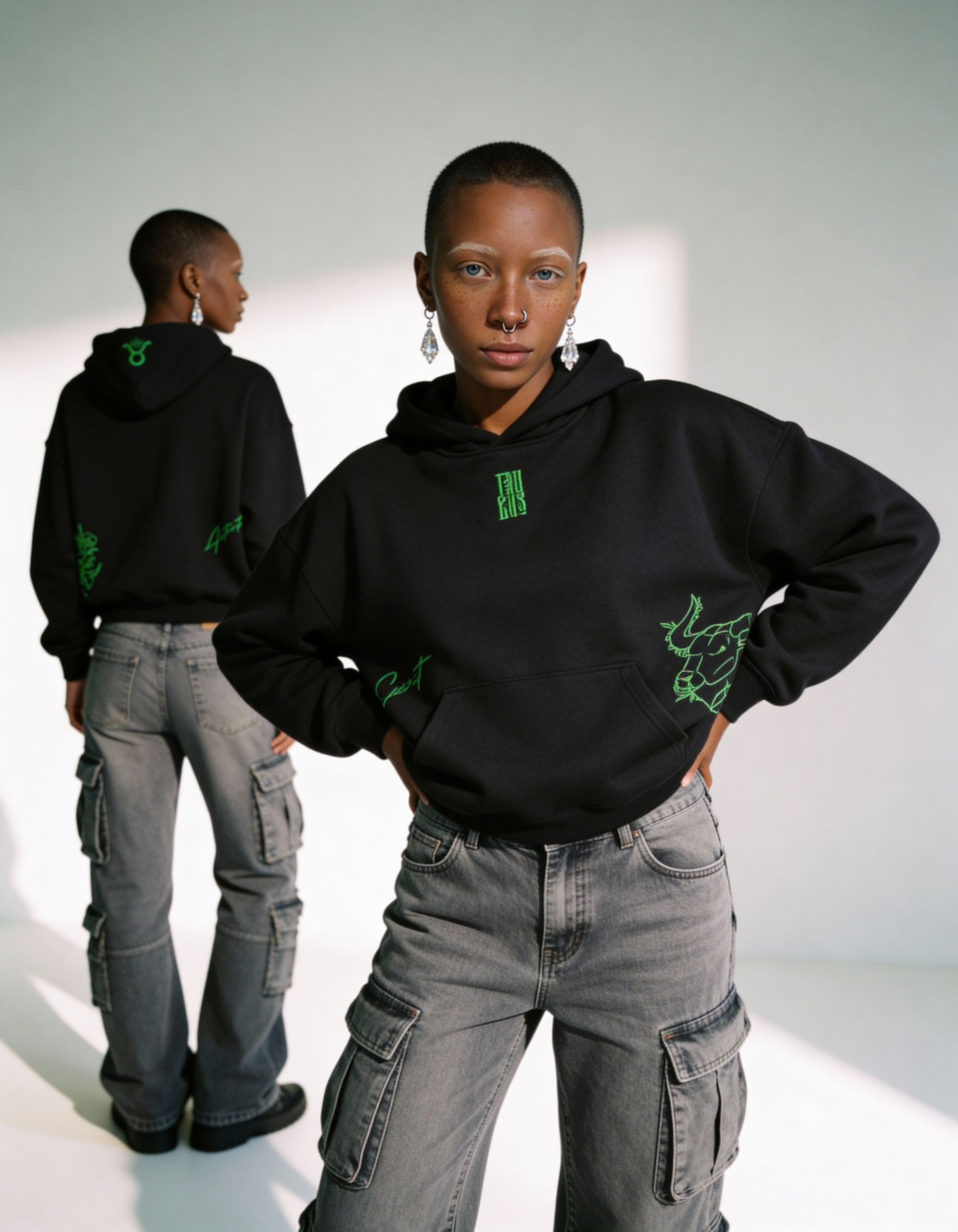 freepik__darkskinned-woman-with-a-short-buz-cut-and-barely-__98373 Taurus Embroidery Hoodie For Women - Image 2