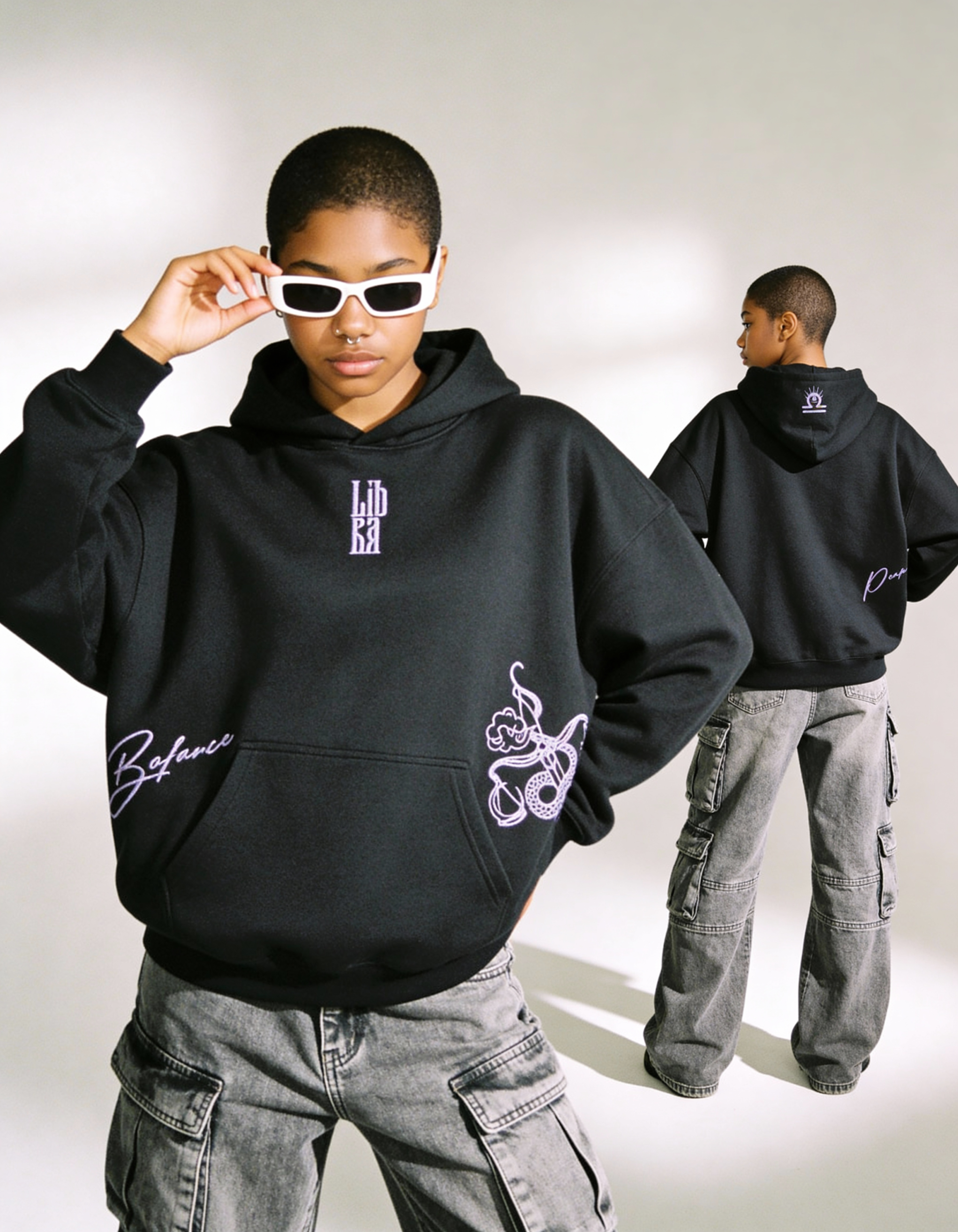 freepik__darkskinned-woman-with-a-short-buz-cut-and-wearing__84471 Libra Embroidery Hoodie For Women