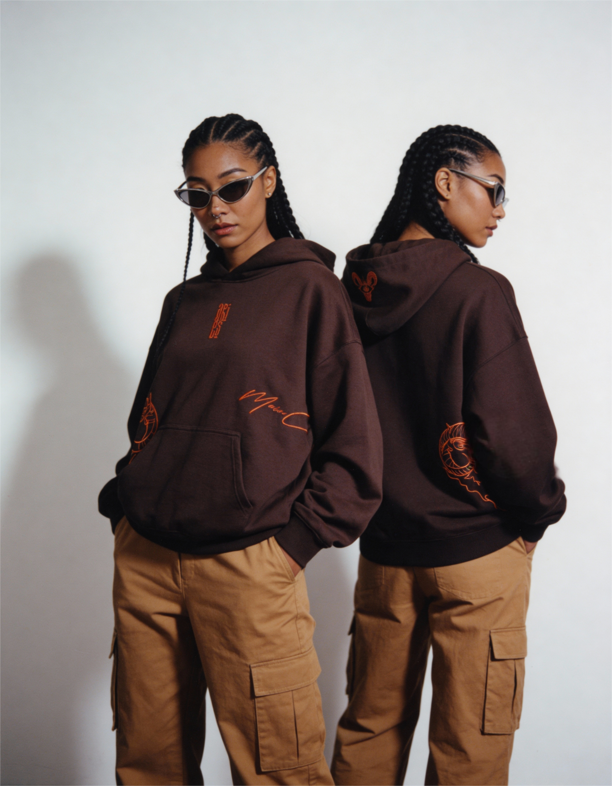 freepik__darkskinned-woman-with-long-braided-hair-and-weari__84484 Aries Embroidery Hoodie For Women - Image 3