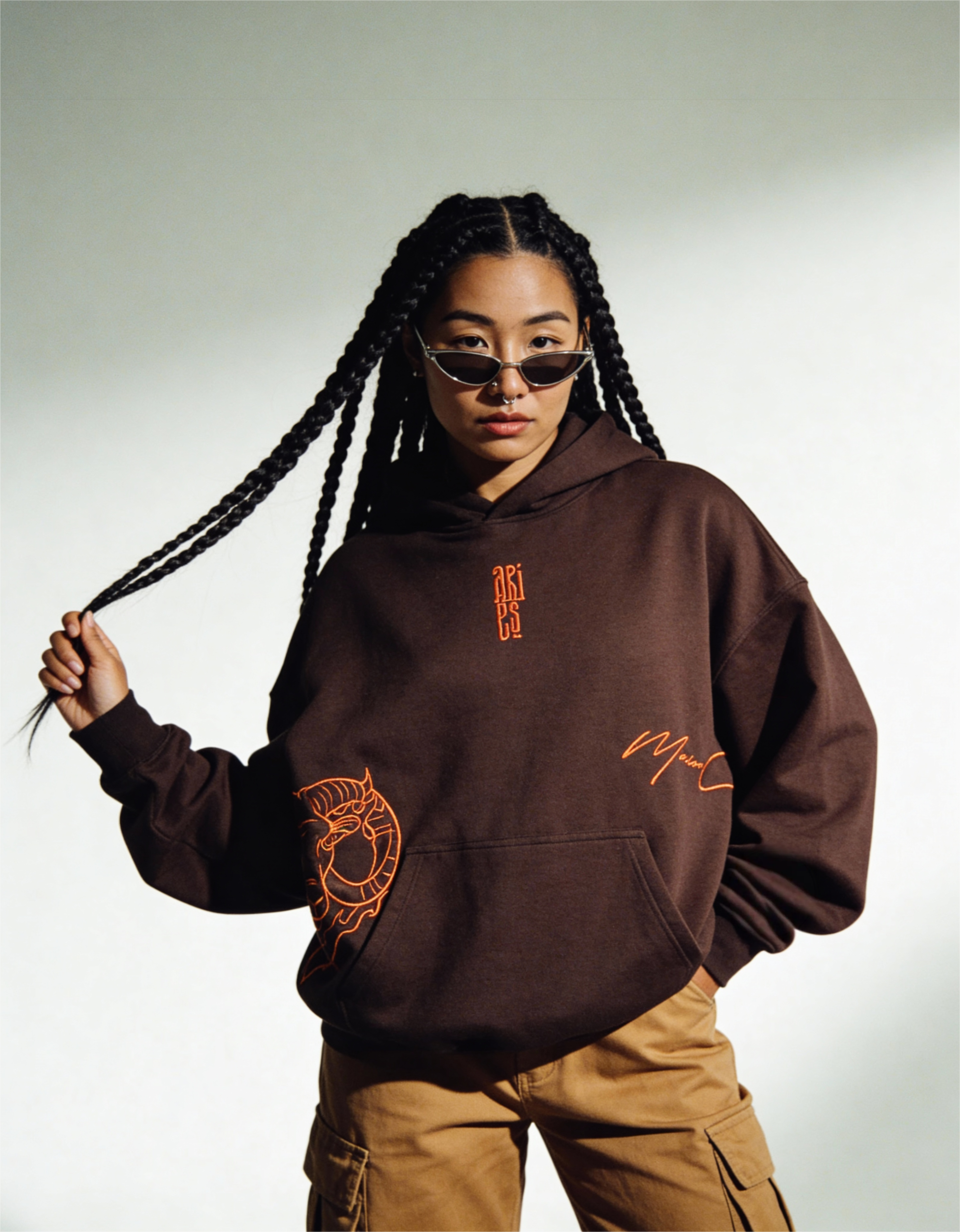 freepik__darkskinned-woman-with-long-braided-hair-and-weari__84486 Aries Embroidery Hoodie For Women