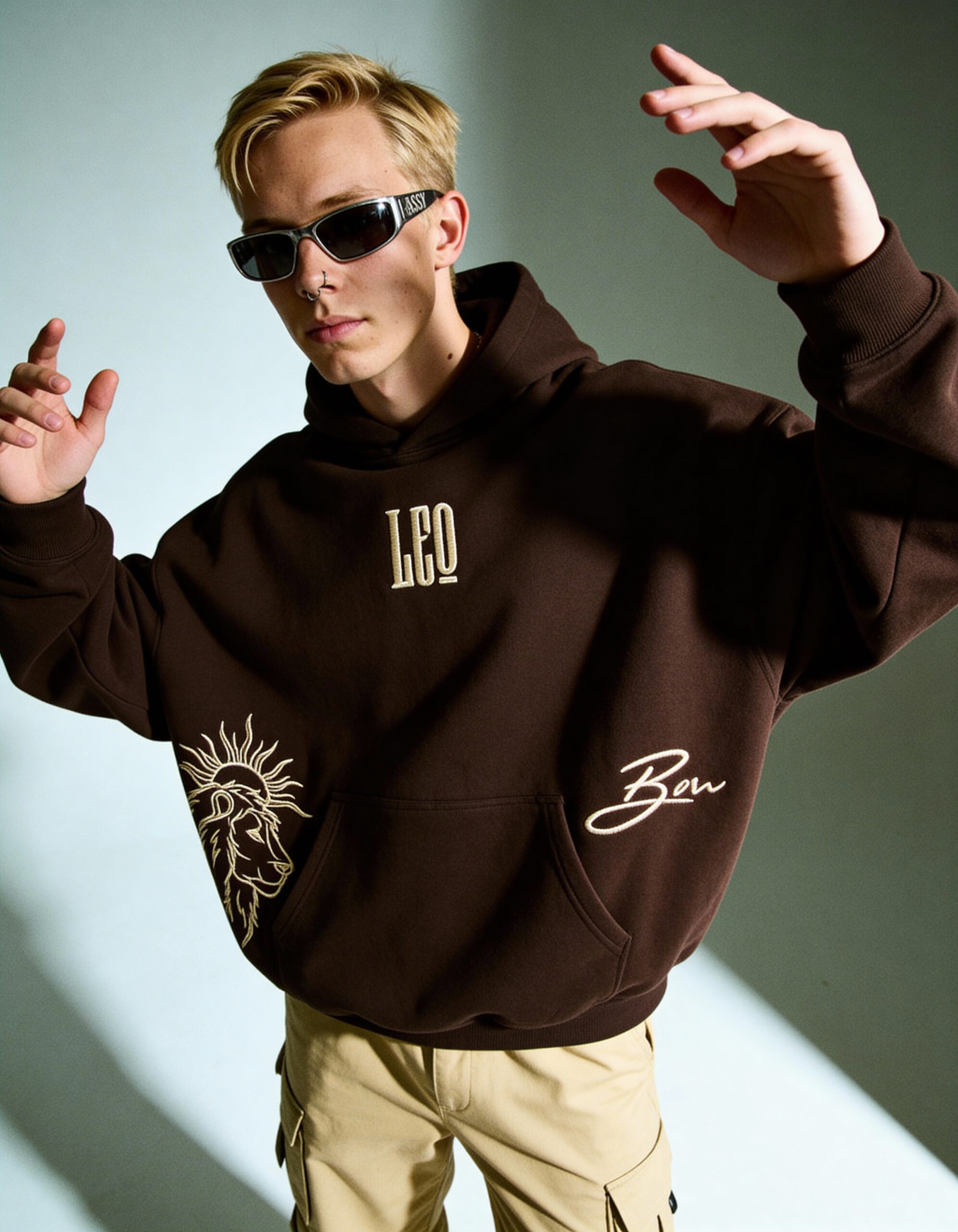 freepik__man-and-wearing-a-nose-ring-and-metal-framed-sassy__75830 Leo Embroidery Hoodie For Men